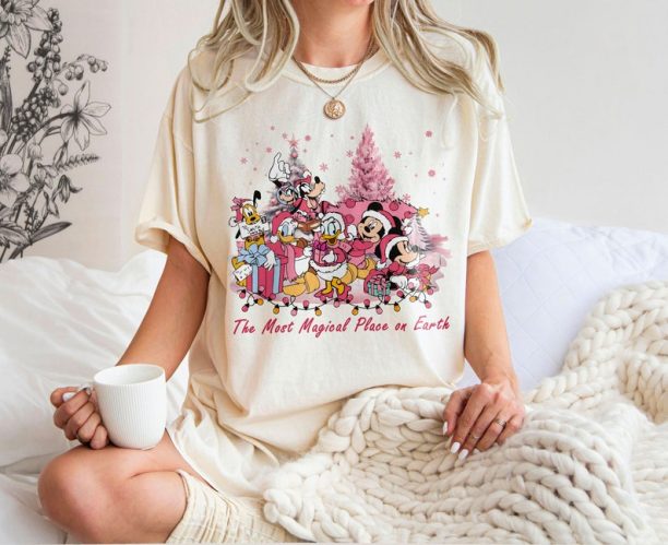 Mickey And Friend Christmas Light Pink tshirts, The Most Magical Place On Earth Shirt, Disney Family Christmas Shirt, Disney Xmas Tee