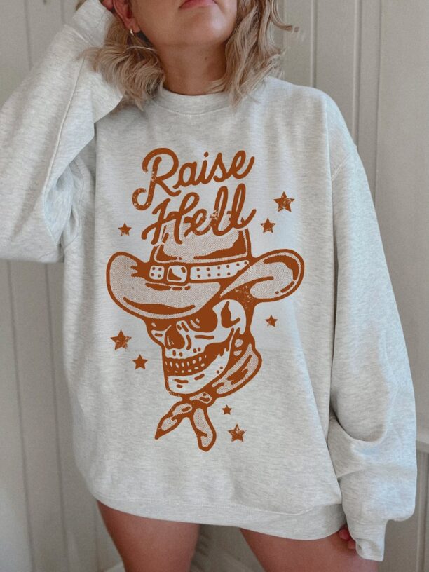 Raise Hell Oversized Sweatshirt Skeleton Cowboy Crewneck Vintage Western Sweater Cowgirl Shirt Wild West USA Cosmic